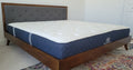 Brooklyn Bedding Signature Hybrid Queen on a bed frame