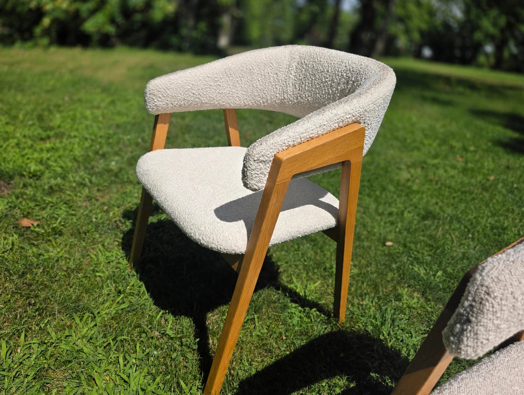 Ivory boucle dining chair, close view