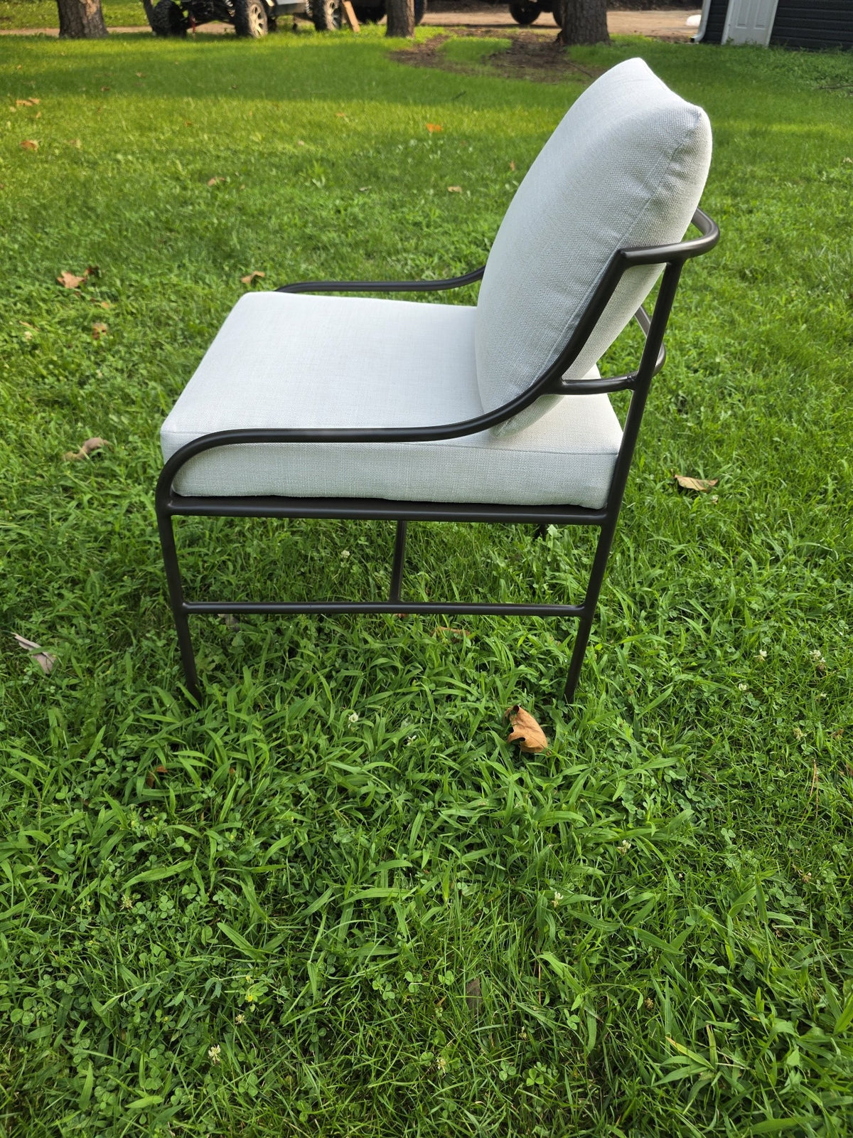 Segovia outdoor dining chair, angled view
